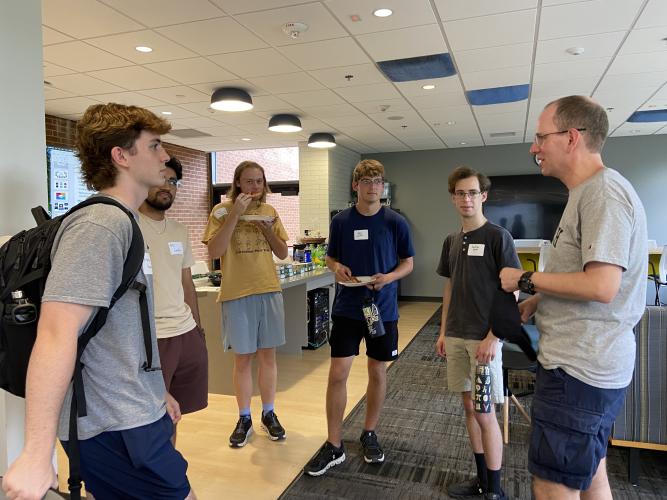 School of Physics Professor Sven Simon greeted some of the new astrophysics majors. 